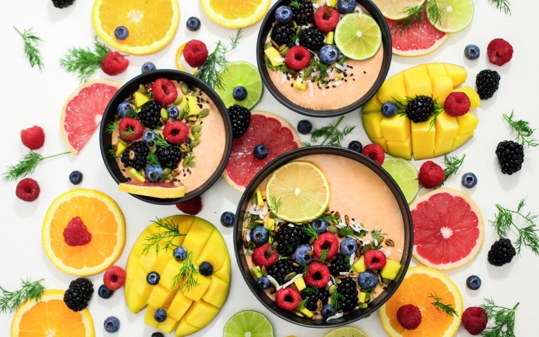 Smoothie bowl of berries and citrus fruits